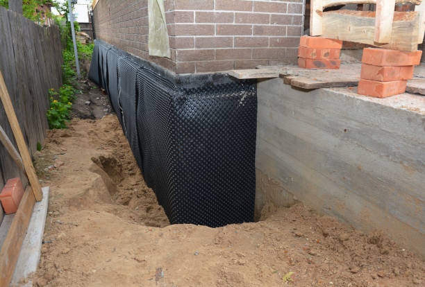 SJ Waterproofing Pros technician performing targeted Waterproofing assessment in Cynthiana, OH